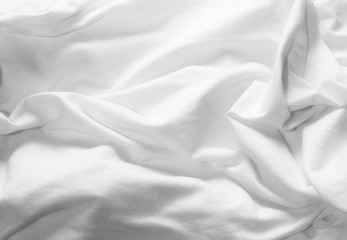 Crumpled white fabric cloth texture