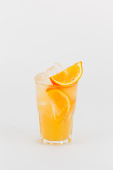 Red berry lemonade with orange on a white background