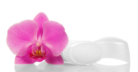Open dry deodorant for underarms and orchid flower isolated.