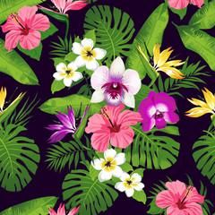 Tropical flowers and leaves on dark background. Seamless. Vector.