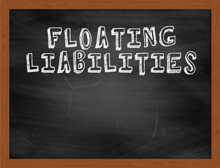 FLOATING LIABILITIES handwritten text on black chalkboard