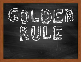 GOLDEN RULE handwritten text on black chalkboard