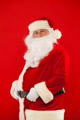 Photo of happy Santa Claus in eyeglasses looking at camera
