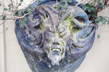 Satyr Woodland god face sculpture