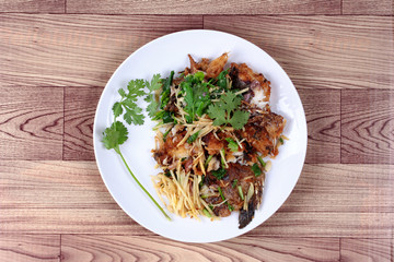 Thai food, Fried ginger with Tilapia fish  (Call Pla Nil Pad Khi