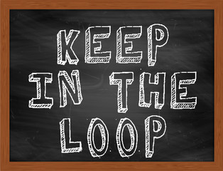 KEEP IN THE LOOP handwritten text on black chalkboard © Ionut  Catalin Parvu