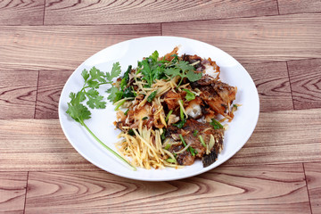 Thai food, Fried ginger with Tilapia fish  (Call Pla Nil Pad Khi