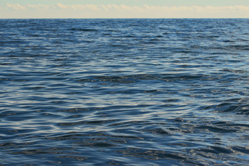 colorful texture patterned background sea waves and clouds 