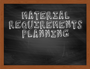 MATERIAL REQUIREMENTS PLANNING handwritten text on black chalkbo