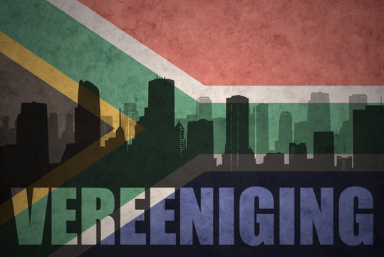 abstract silhouette of the city with text Vereeniging at the vintage south africa flag