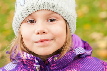 Funny smiling Caucasian little girl, closeup © evannovostro