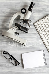 lab assistant desk with microscope top view