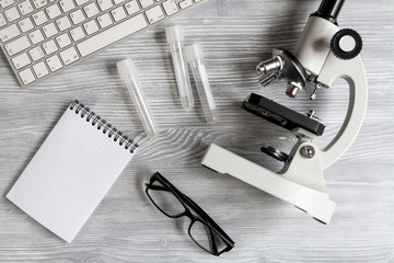 lab assistant desk with microscope top view