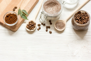 homemade coffee-sugar scrub top view wooden background