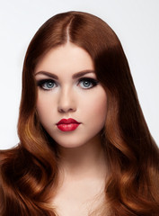 Fototapeta premium Ginger red long hair.Fashion portrait red lips