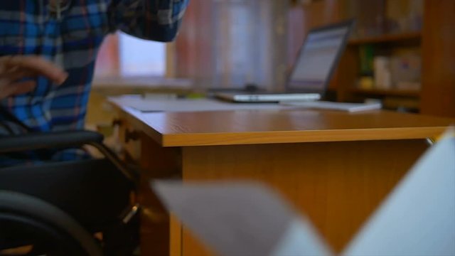 3 in 1 video! The man throw a paper from the table. Slow motion