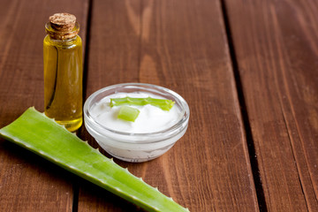 cream with added aloe vera on wooden background macro