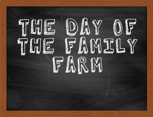 THE DAY OF THE FAMILY FARM handwritten text on black chalkboard