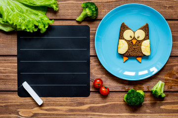 children's menu place for text top view wooden background