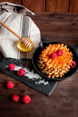 cooking holiday breakfast with wafer on wooden background and tablecloth