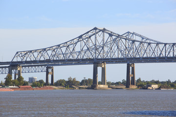 Fototapeta premium Crescent City Connection Bridge carries traffic over the Mississippi river