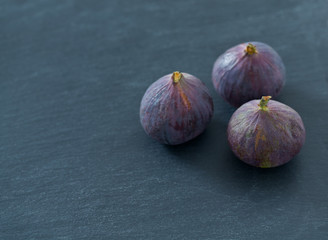 fresh figs on stone background