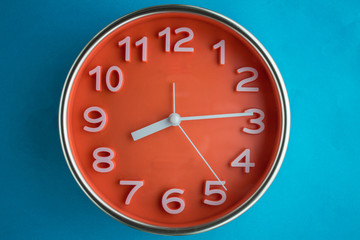 Fototapeta na wymiar clock on blue background