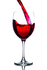 Pouring red wine into the glass