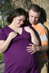 Portrait Of A Pregnant Woman With Daddy