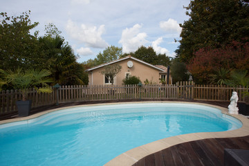 Swimming pool with stair at hotel close up
