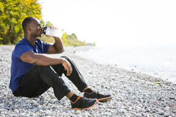 young man relaxing on the beach