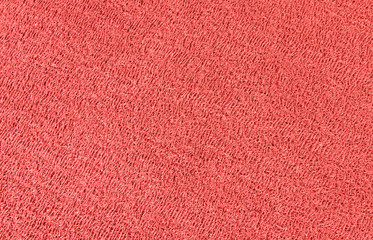 Close up of red rubber floor background.
