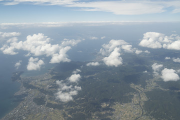 Land visible from inside the airplane