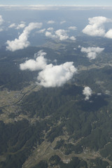 Land visible from inside the airplane