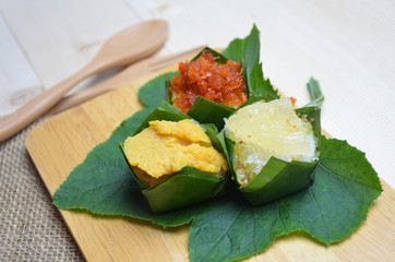 Delicious thai desserts in the wood plate in thailand