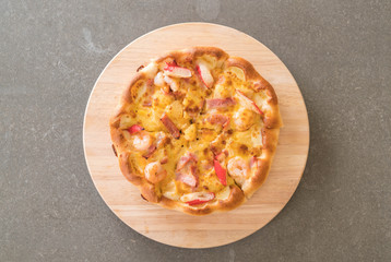 Homemade hawaiian seafood pizza