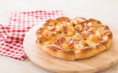 Homemade hawaiian seafood pizza