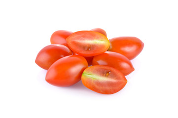 whole and half cut fresh tomato on white background
