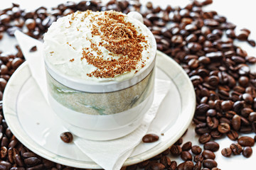 Cappuccino coffee on beans
