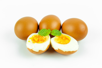 Boiled eggs cut in half isolated on white background