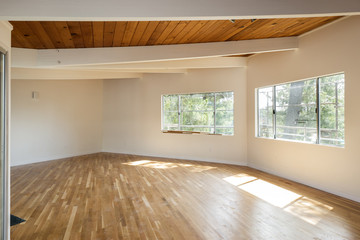 Spacious bright empty living room interior.