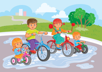 Young children ride bicycles in park