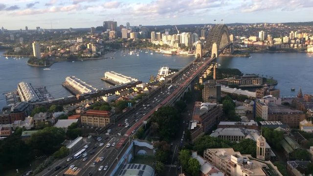 Aerial view of traffic on Sydney Harbour Bridge at dusk in Sydney, New South Wales Australia.