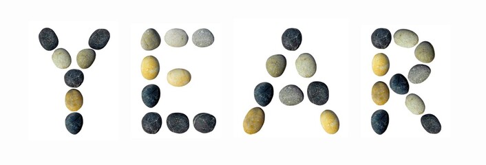 The word Year made of pebbles.