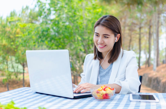 Pretty Young Asain Woman  Working