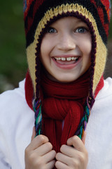 young girl wearing hat