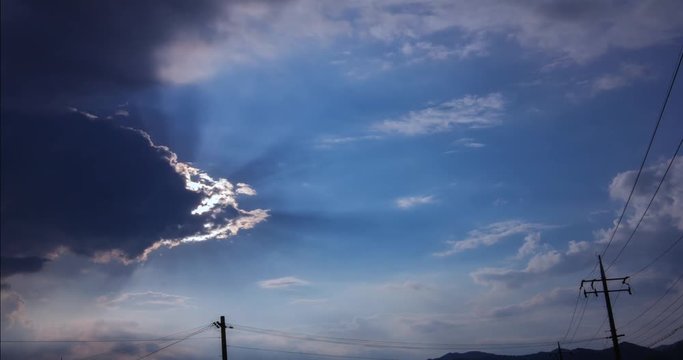 Gyeongbuk, Korea, Timelapse view of Telephone poles at the sunbeam