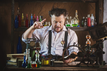 crazy medieval scientist working in his laboratory