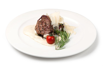Roasted meat under white sauce