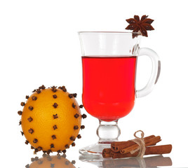 Mulled wine, oranges with cloves, star anise, cinnamon isolated.
